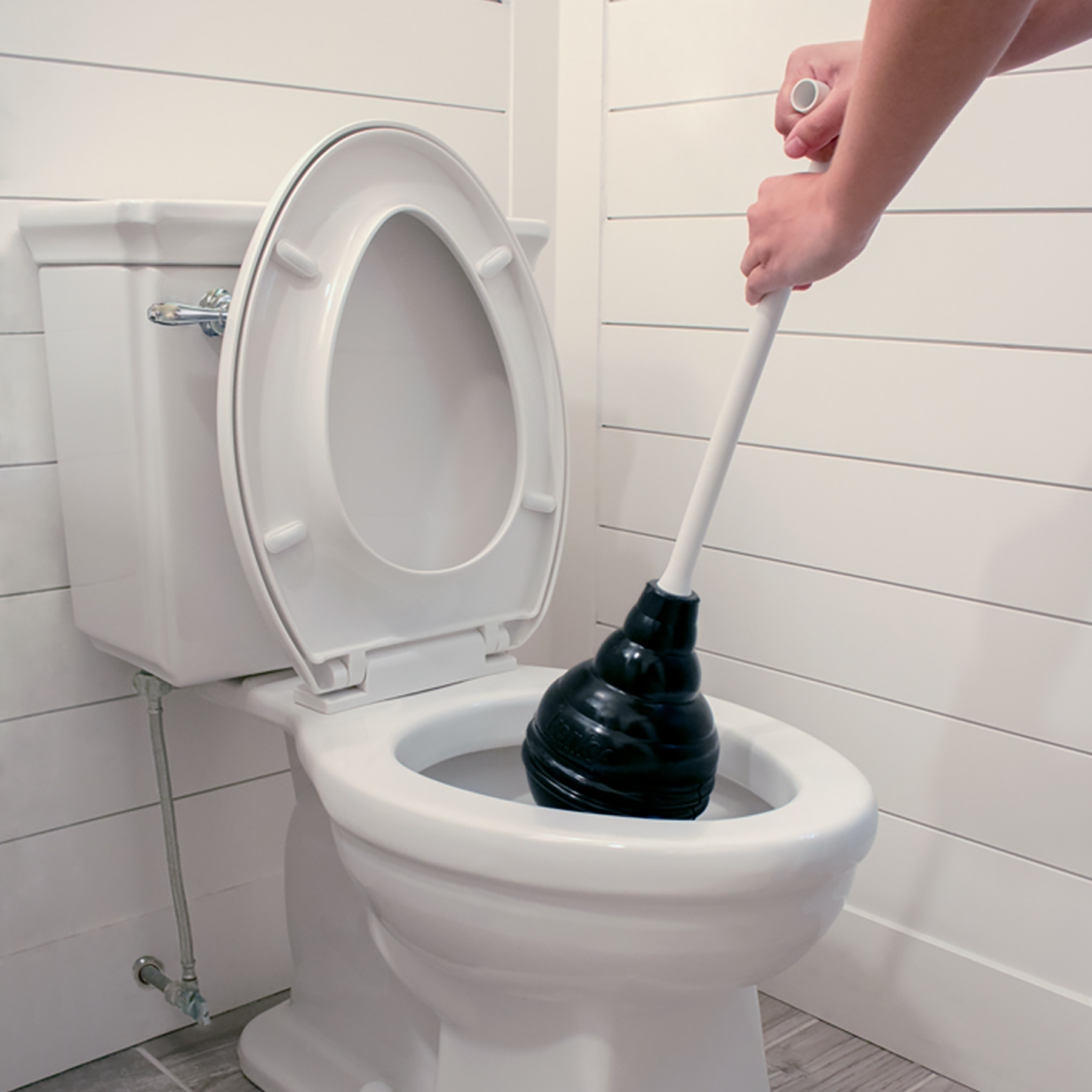 Beehive Max Toilet Plunger Unclogging a drain