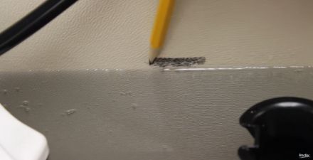 Mark waterline with pencil