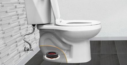 this image shows a toilet sitting on a wax free gasket
