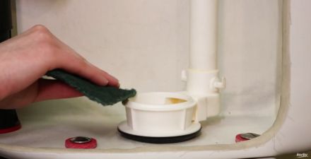 this image shows you how to clean the flush valve opening